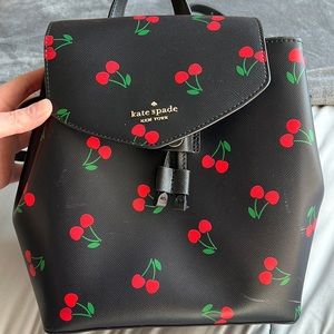 Kate spade back pack bag. Small white scuff. Shown in picture